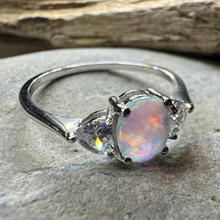 Load image into Gallery viewer, Opal ring on a stone surface with a natural background