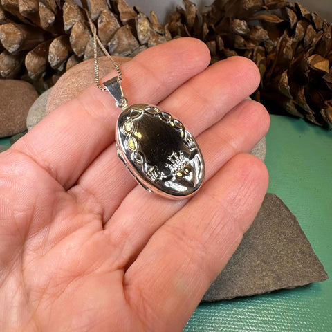Load image into Gallery viewer, Oval Claddagh Locket Necklace in Sterling Silver