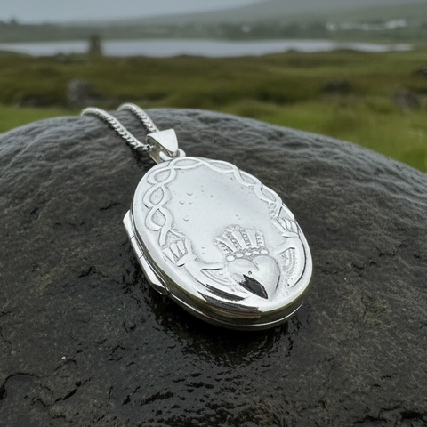 Load image into Gallery viewer, Oval Claddagh Locket Necklace in Sterling Silver