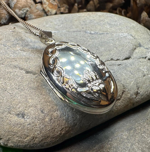 Load image into Gallery viewer, Oval Claddagh Locket Necklace in Sterling Silver