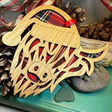 Load image into Gallery viewer, Highland Cow Ornament, Santa Christmas Ornament, Scotland Gift, Scottish Cow, Tartan Gift, Christmas Tree Ornament, Holiday Oak Wood Plaque