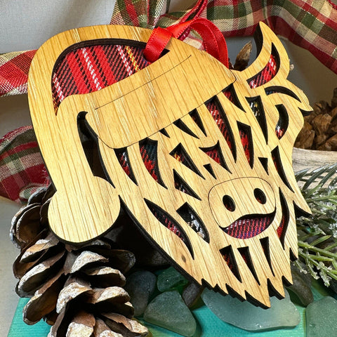 Load image into Gallery viewer, Highland Cow Ornament, Santa Christmas Ornament, Scotland Gift, Scottish Cow, Tartan Gift, Christmas Tree Ornament, Holiday Oak Wood Plaque