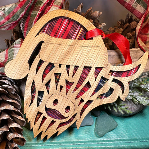 Load image into Gallery viewer, Highland Cow Ornament, Santa Christmas Ornament, Scotland Gift, Scottish Cow, Tartan Gift, Christmas Tree Ornament, Holiday Oak Wood Plaque