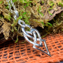 Load image into Gallery viewer, Sterling Silver Celtic Necklace. Celtic love knot necklace is based on a design found on a piece of jewelry at a ancient site in Ireland.