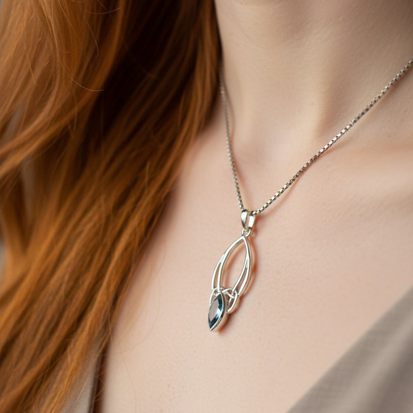 Vanessa Trinity Knot Blue Topaz Necklace — view 2