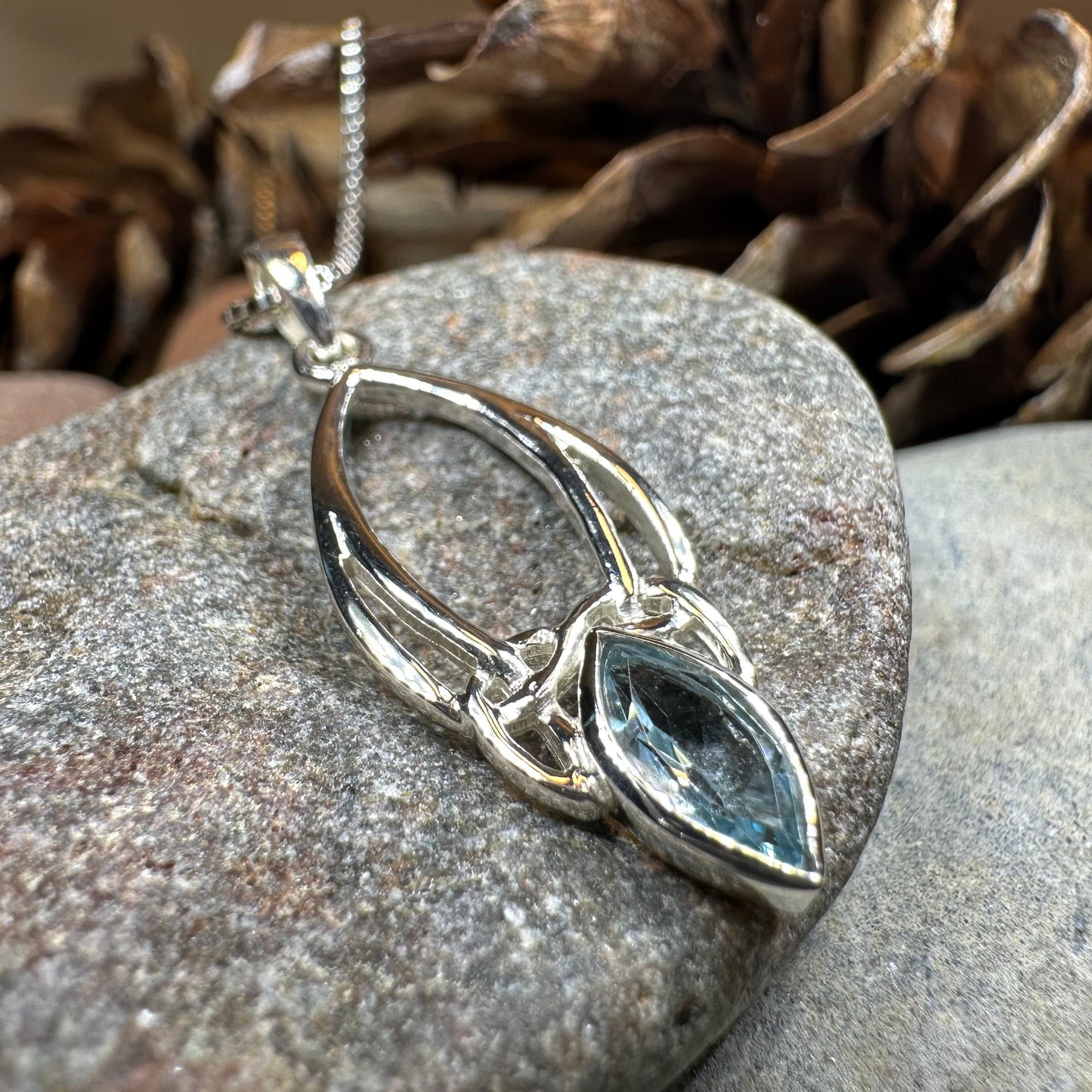 Vanessa Trinity Knot Blue Topaz Necklace — view 10