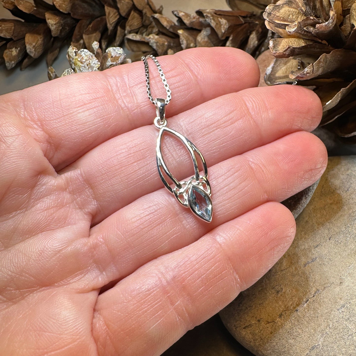 Vanessa Trinity Knot Blue Topaz Necklace — view 4