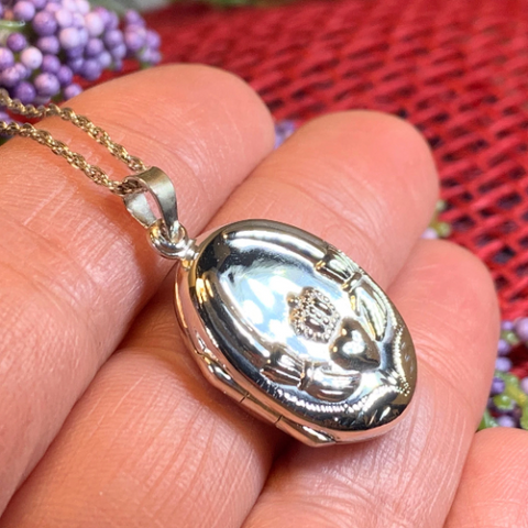 Load image into Gallery viewer, Irish Claddagh Locket Necklace in Sterling Silver
