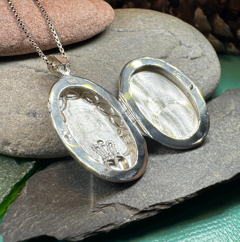Load image into Gallery viewer, Oval Claddagh Locket Necklace in Sterling Silver
