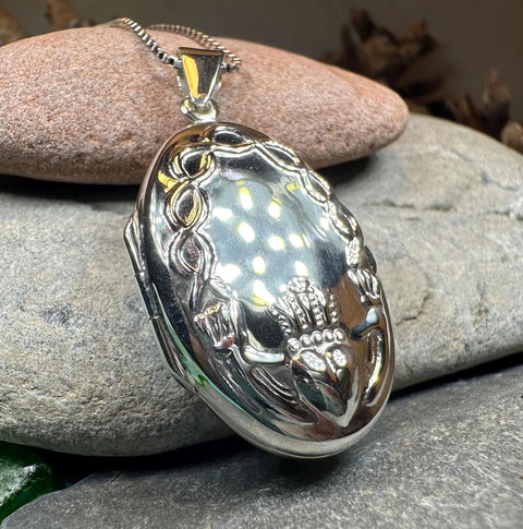 Load image into Gallery viewer, Oval Claddagh Locket Necklace in Sterling Silver
