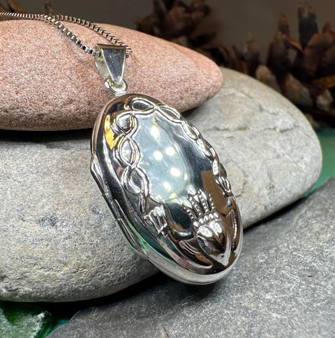Load image into Gallery viewer, Oval Claddagh Locket Necklace in Sterling Silver
