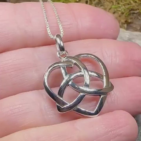 Load and play video in Gallery viewer, Celtic Love Knot Necklace in Sterling Silver
