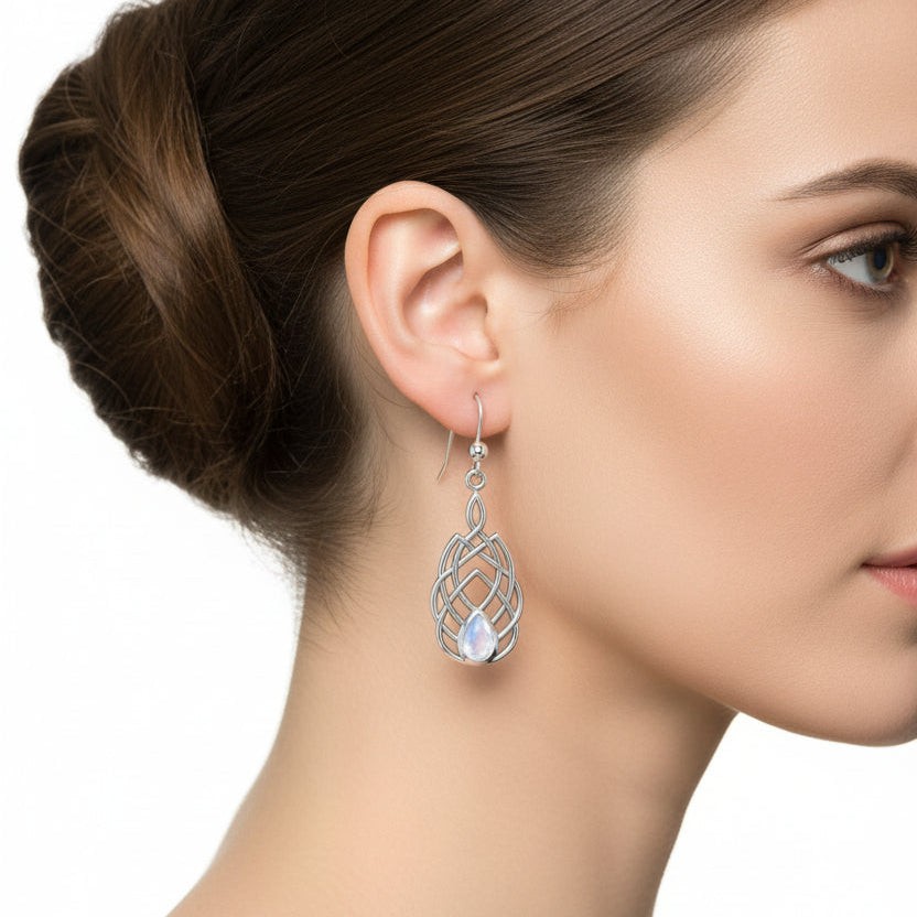 Sterling Silver earrings features traditional Celtic designs symbolizing love and friendship. Perfect gift for Celtic heritage.