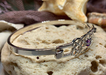 Load image into Gallery viewer, Solid sterling silver Celtic bangle bracelet with authentic amethyst stone. Celtic knot work bracelet crafted from sterling silver with a 1 carat square cut amethyst stone with deep purple color.
