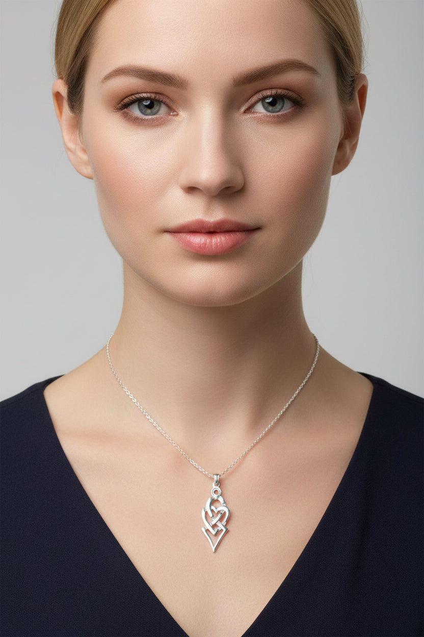 Sterling Silver Celtic Necklace. Celtic love knot necklace is based on a design found on a piece of jewelry at a ancient site in Ireland.