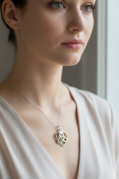 Load image into Gallery viewer, Celtic Love Knot Necklace in Sterling Silver
