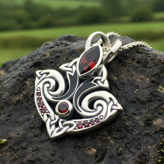 Eternal Flame Trinity Knot Garnet Necklace in Sterling Silver