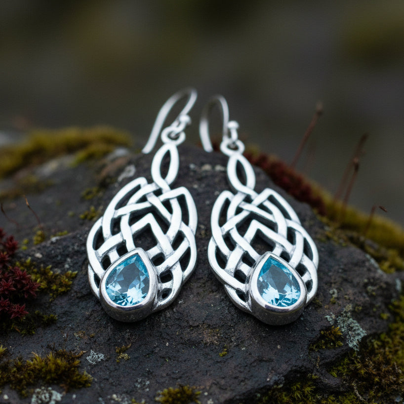 Sterling Silver earrings features traditional Celtic designs symbolizing love and friendship. Perfect gift for Celtic heritage.