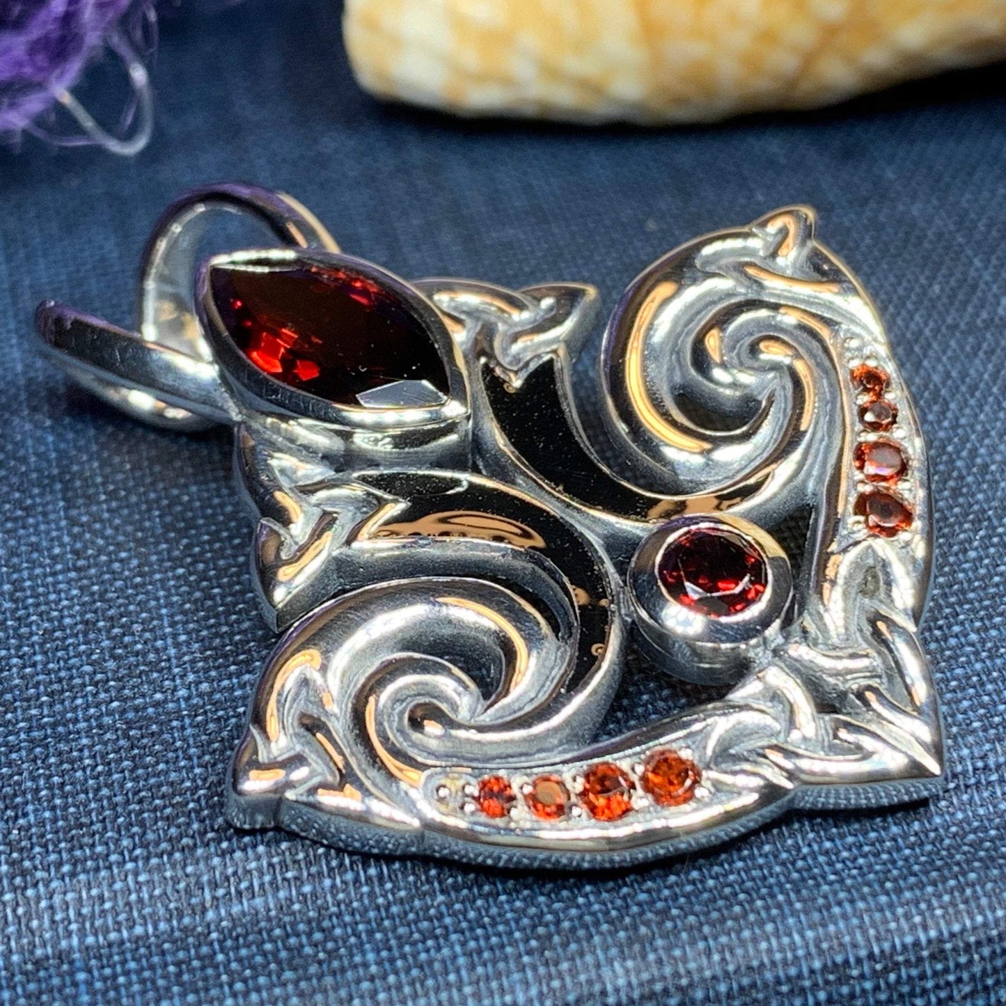 Eternal Flame Trinity Knot Garnet Necklace in Sterling Silver — view 8