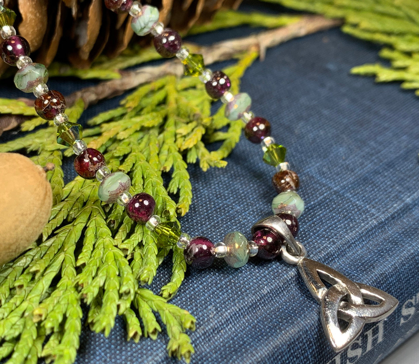 Wine & Roses Trinity Knot Necklace — view 5